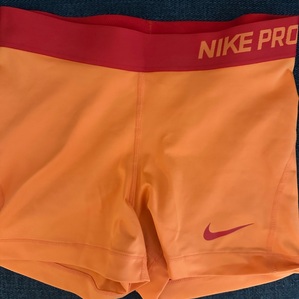 Nike Pro Bright Orange Shorts with Red Accents